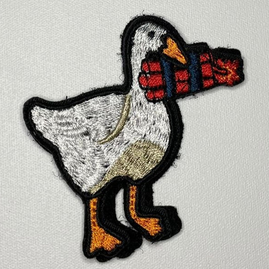 Embroidered Patch - Goose hoolding Dynamite